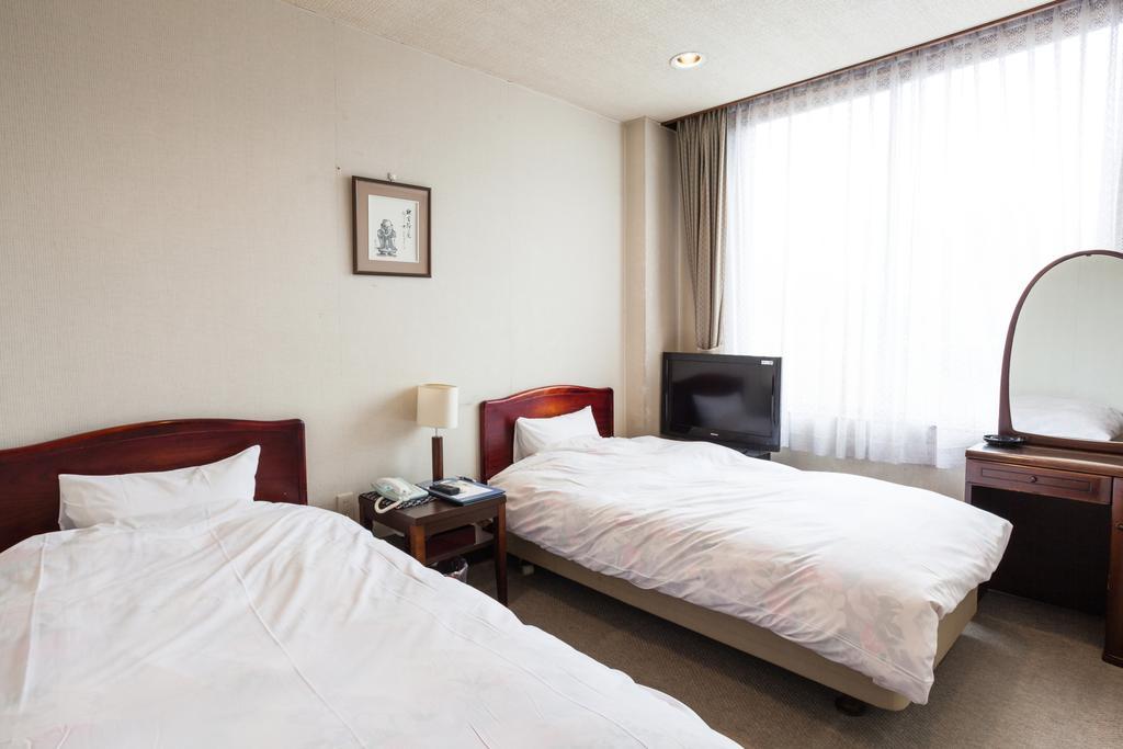 Hotel Mikunitoge Onsen Oyado Honjin Yuzawa  Exterior foto